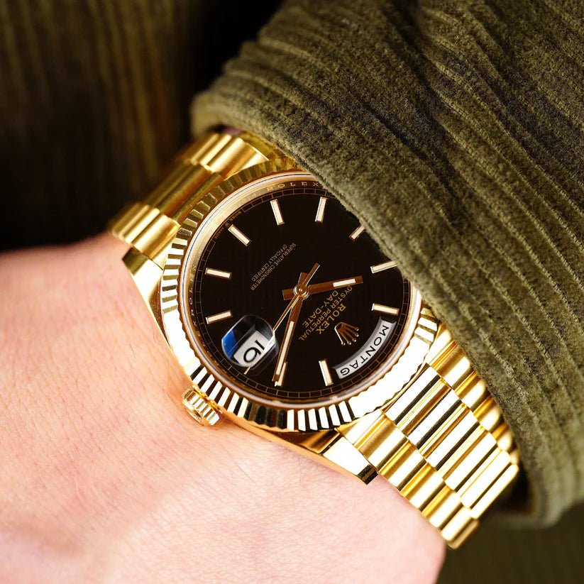 Rolex Day-Date 40mm Gold with Black Dial