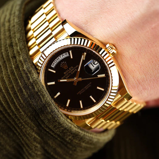 Rolex Day-Date 40mm Gold with Black Dial